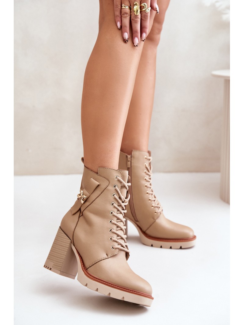 Insulated ankle boots on a heel with a golden detail beige Ivarisse