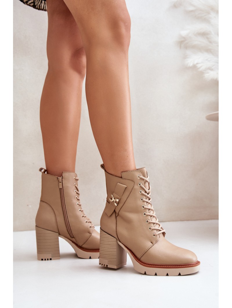 Insulated ankle boots on a heel with a golden detail beige Ivarisse