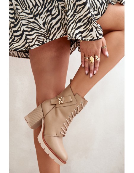 Insulated ankle boots on a heel with a golden detail beige Ivarisse