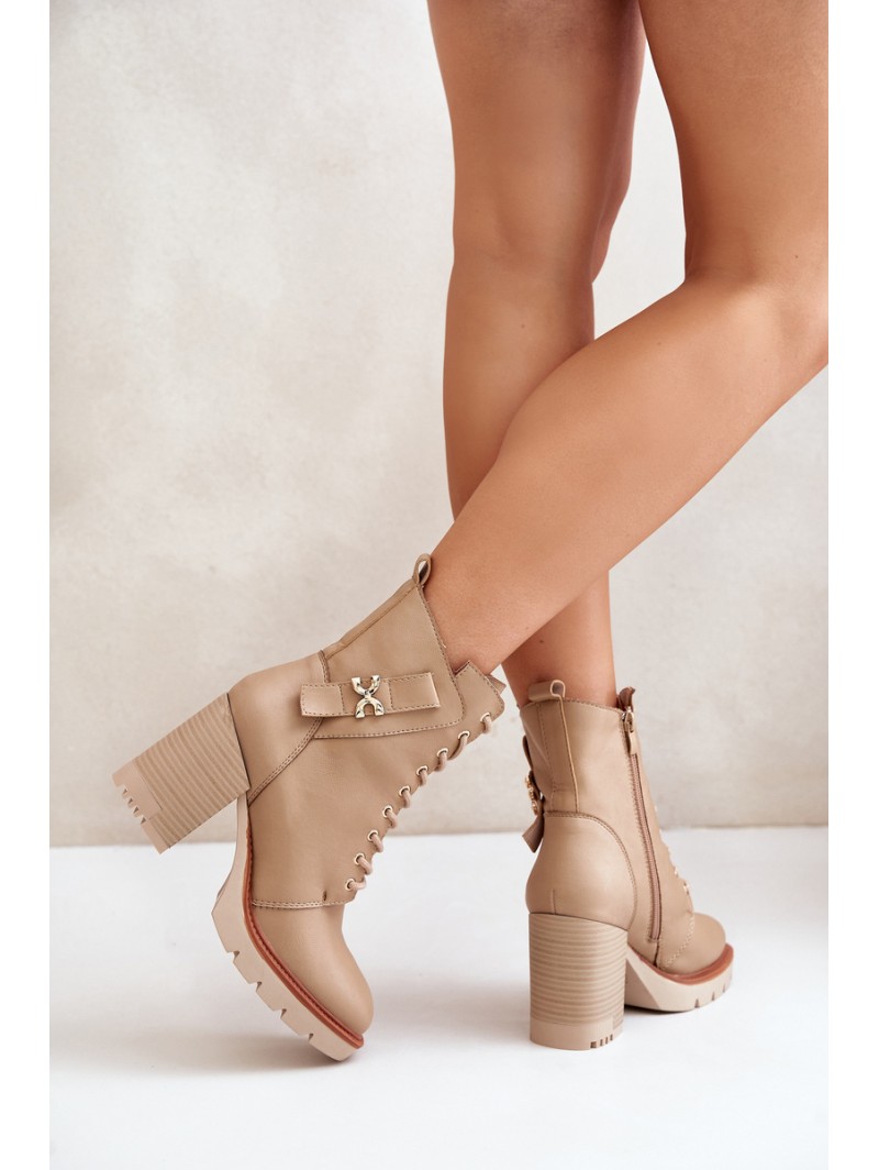 Insulated ankle boots on a heel with a golden detail beige Ivarisse