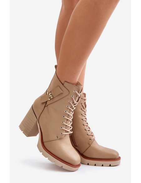 Insulated ankle boots on a heel with a golden detail beige Ivarisse
