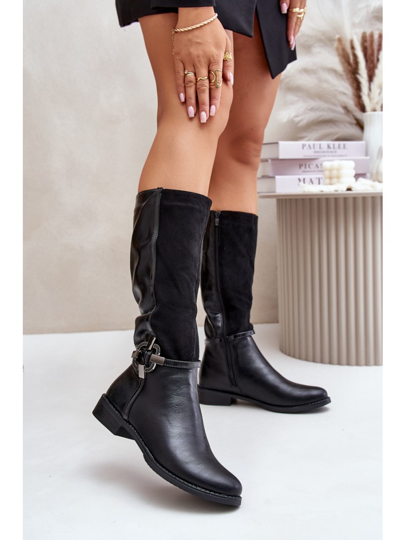 Insulated boots on a flat heel with a decorative buckle black Leatharia