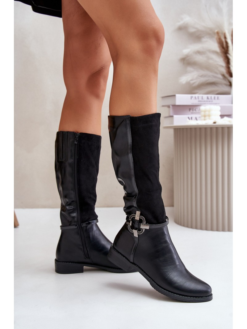 Insulated boots on a flat heel with a decorative buckle black Leatharia