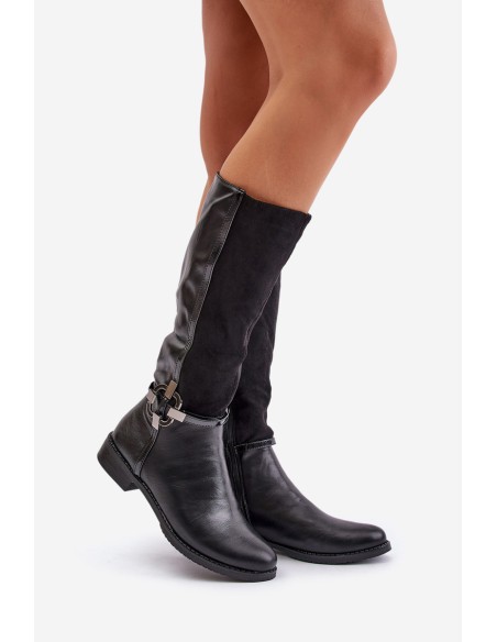 Insulated boots on a flat heel with a decorative buckle black Leatharia