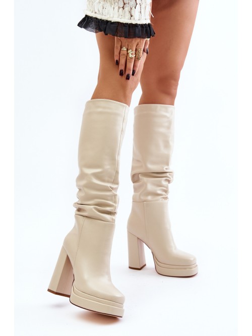 Slip-on ankle boots on a heel and platform with gathering warm light beige Beridra