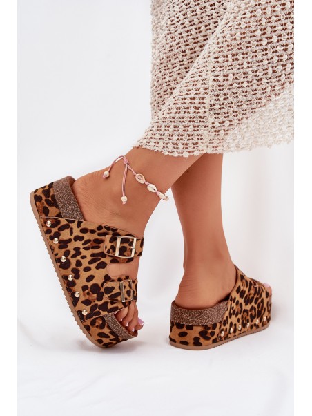 Women's sandals with buckles on a massive platform leopard Odisene
