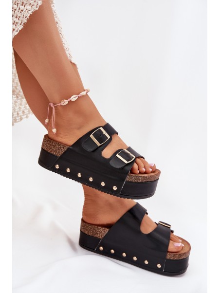 Women's sandals with buckles on a massive platform black Odisene