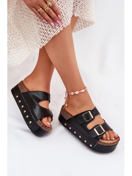 Women's sandals with buckles on a massive platform black Odisene