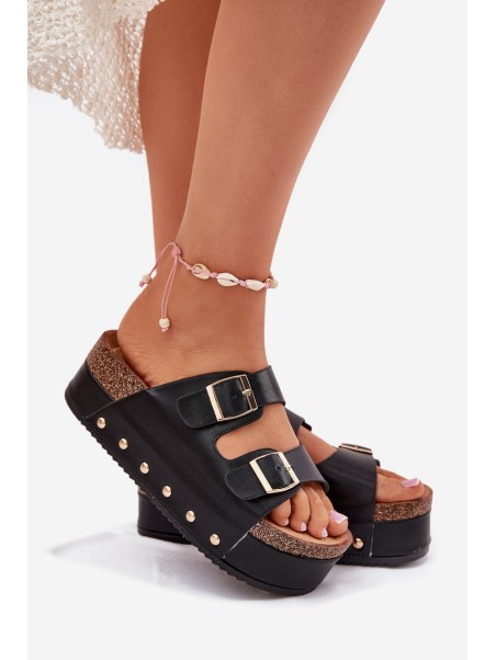 Women's sandals with buckles on a massive platform black Odisene