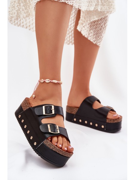 Women's sandals with buckles on a massive platform black Odisene
