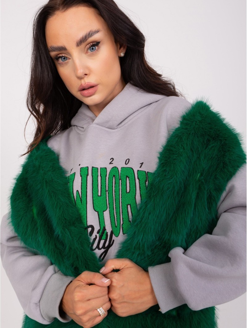 Tamsiai žalia liemenė