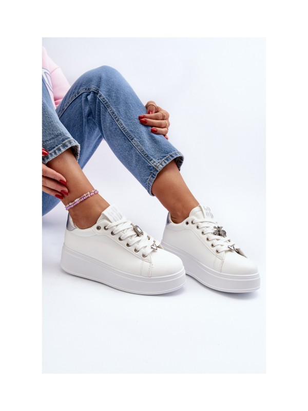 Moteriški sportbačiai su storu padu ir dekoratyviniu suvarstymu