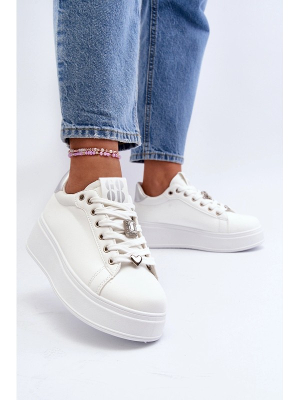 Moteriški sportbačiai su storu padu ir dekoratyviniu suvarstymu