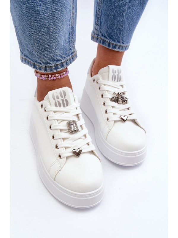 Moteriški sportbačiai su storu padu ir dekoratyviniu suvarstymu